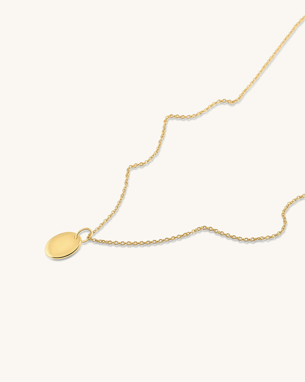 Gold disc pendant necklace