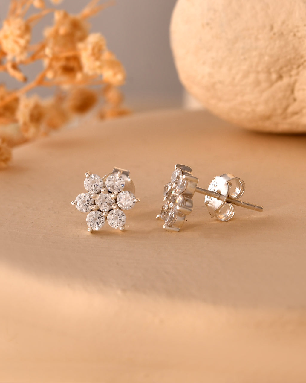 Floral white stone stud earrings