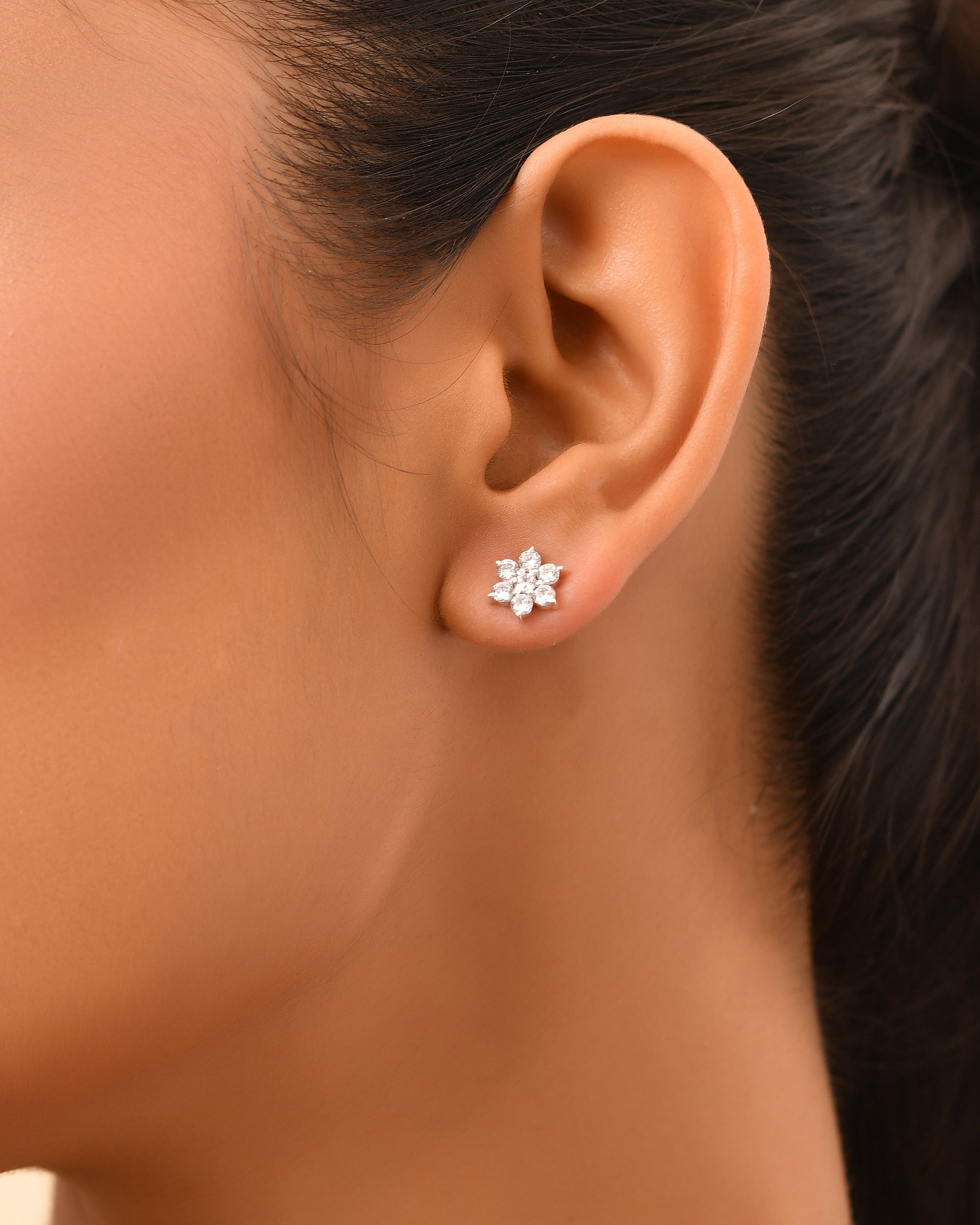 Floral white stone stud earrings
