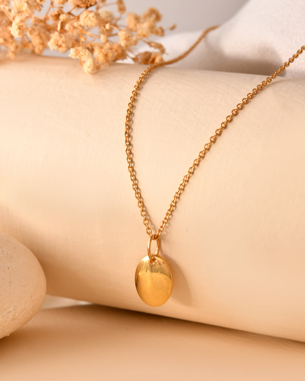 Gold disc pendant necklace