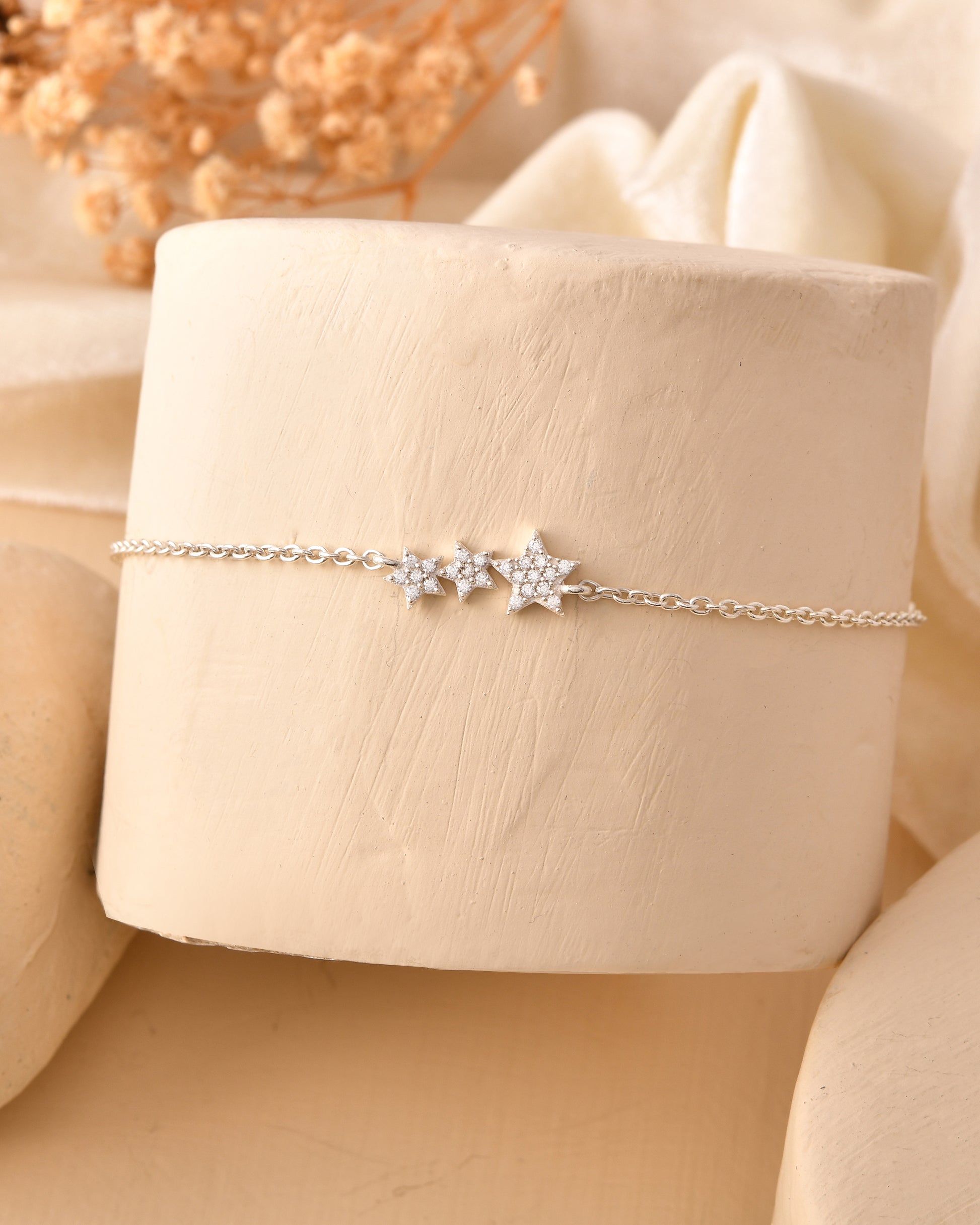 Silver triple star bracelet