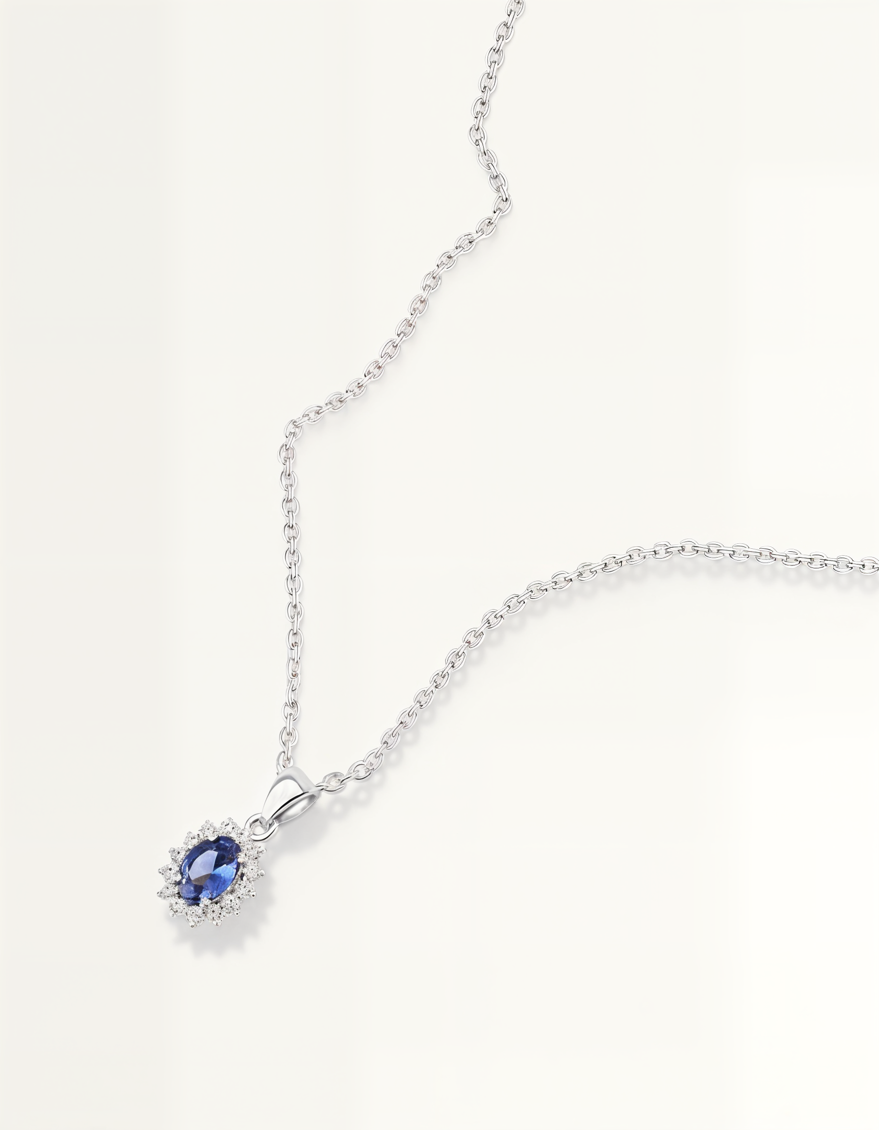 Blue oval halo pendant necklace